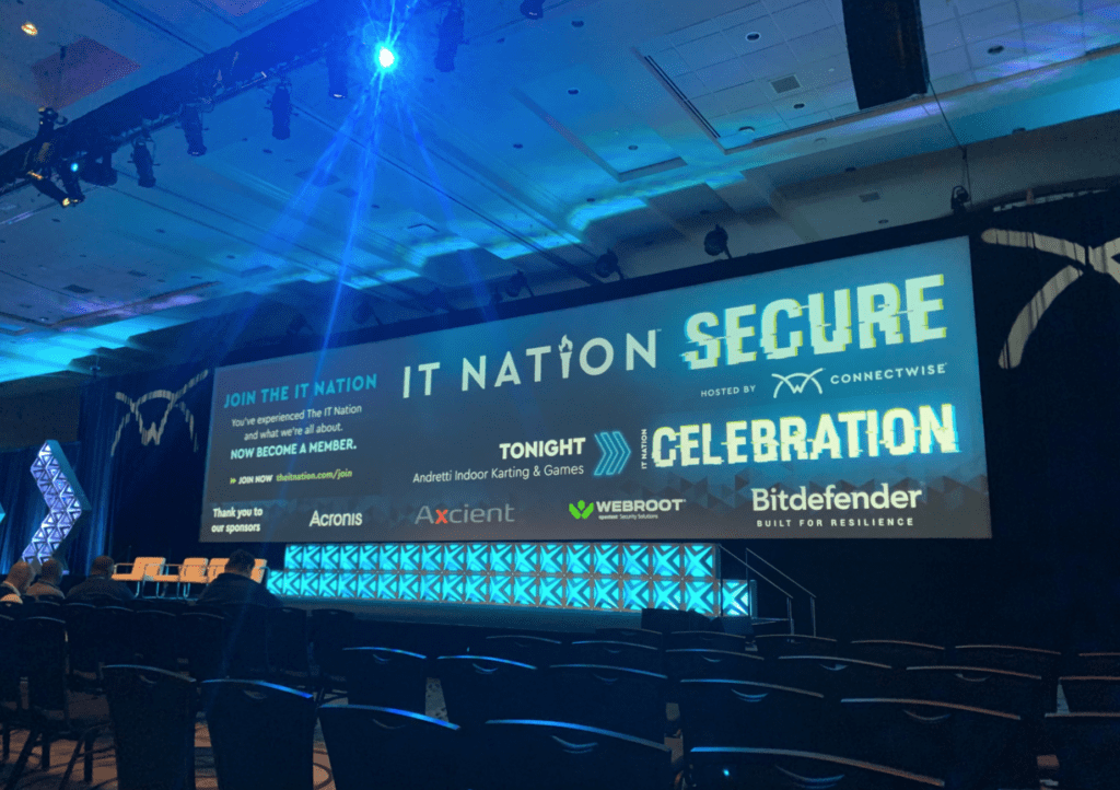 The presenter stage at the IT Nation Secure conference attended by employees at M.A. Polce IT and Cybersecurity