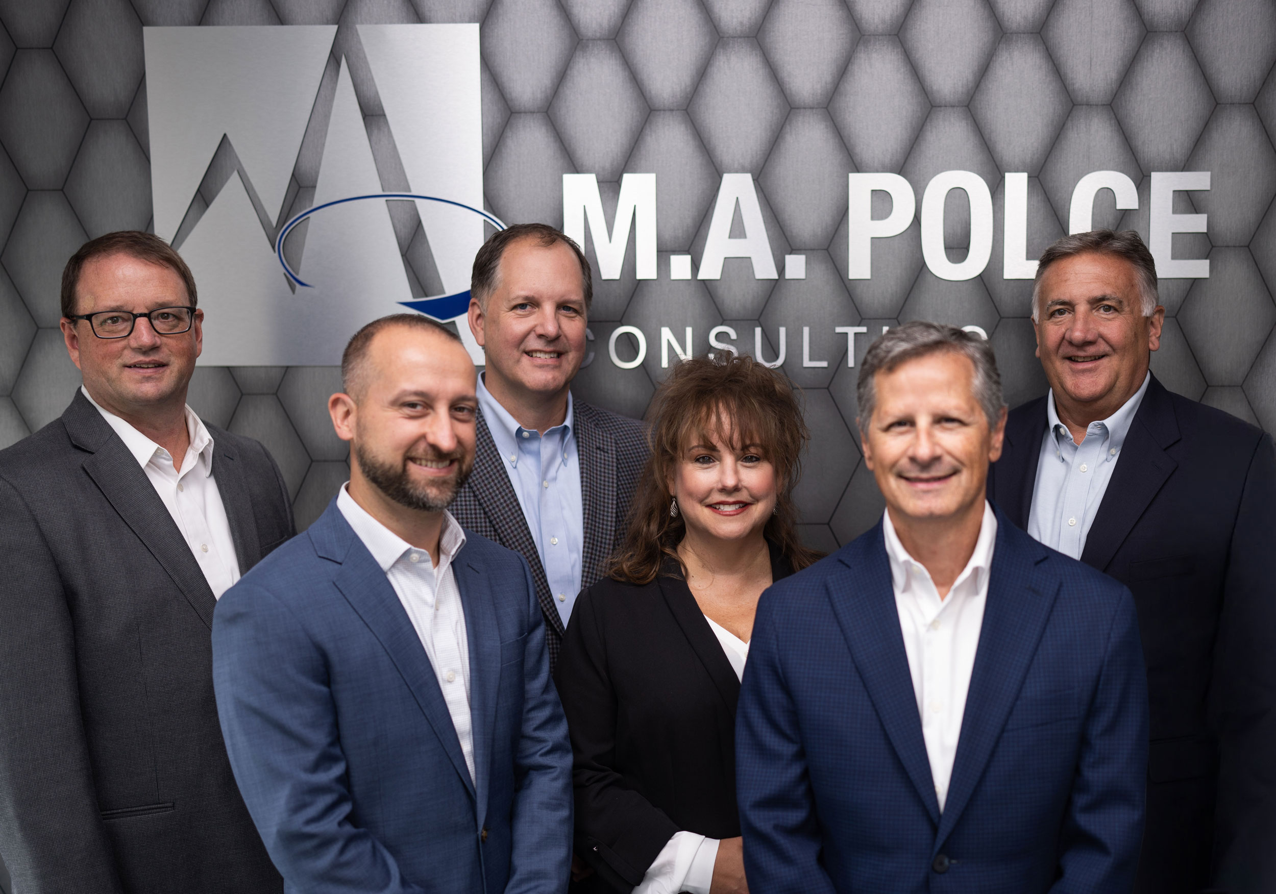 Leadership team photo for M.A. Polce, an MSP and MSSP company that delivers IT and cybersecurity services to businesses and organizations in Central and Western New York